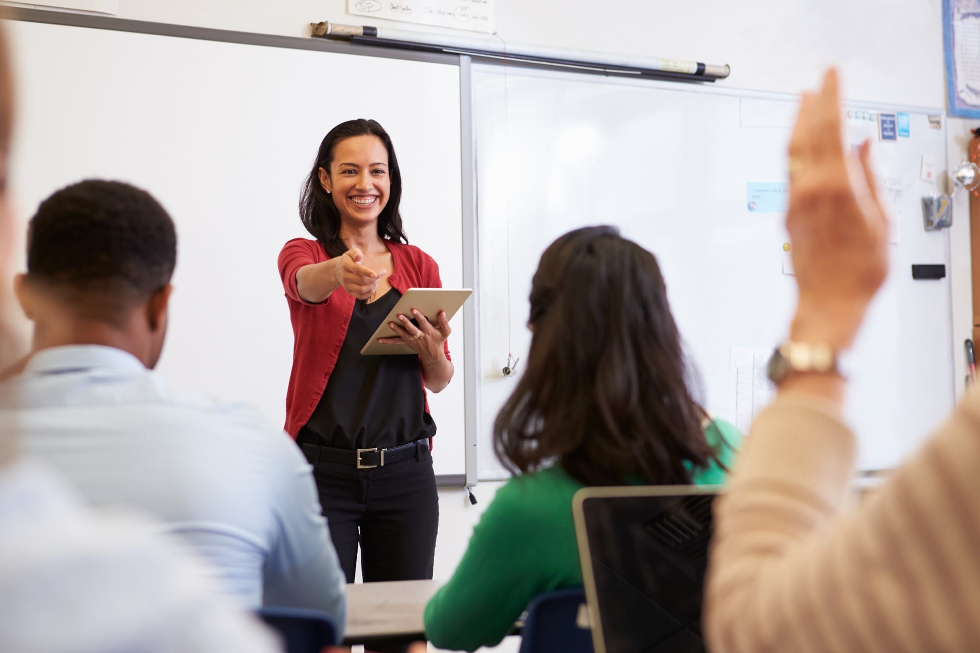Teacher With Tablet and Students at an Adult Education Class.